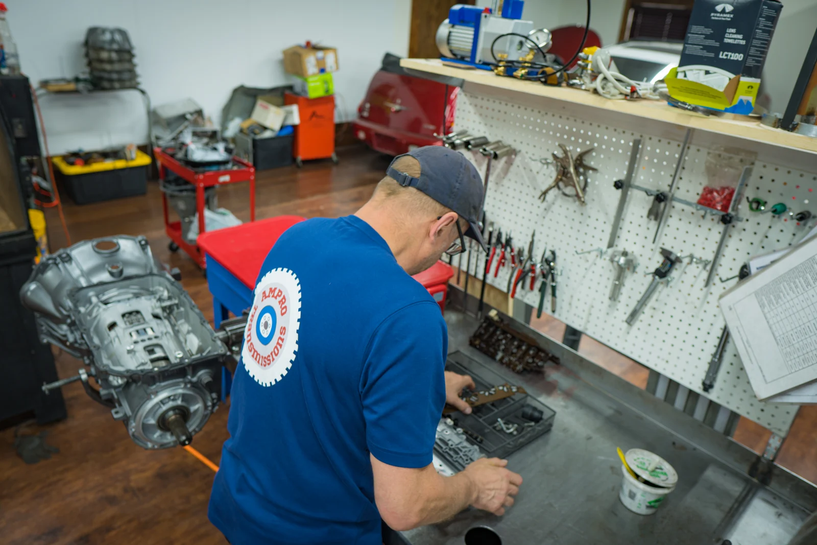 AMPro builder working in the shop; not a 4L80 product photograph
